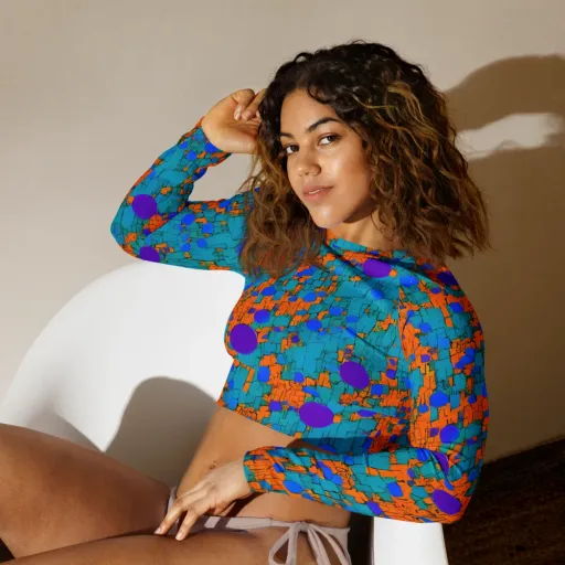 Intergalactic Rhythms on a Long Sleeve Crop Top