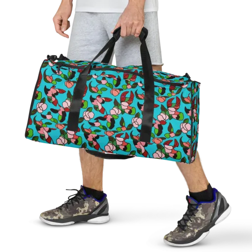 Turquoise Bloom Flight on a Duffle Bag