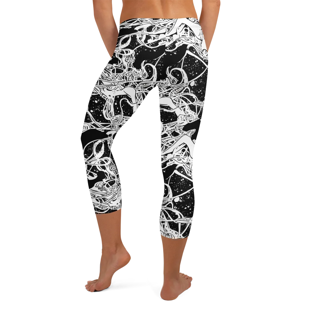 Chaos in Black on Capri Leggings — Back