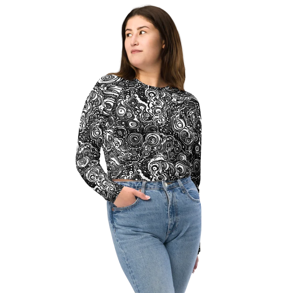 Swirling Stories on Long Sleeve Crop Top — Front