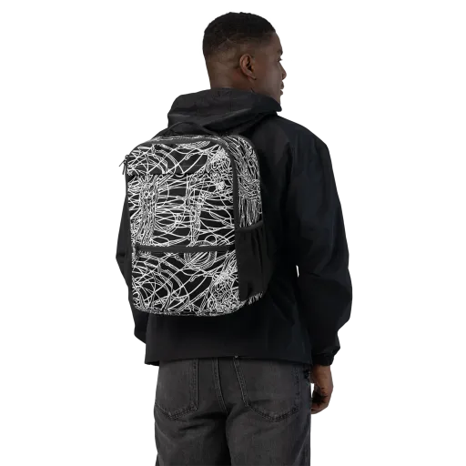 Ivory Entanglement on a Utility Backpack