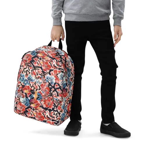 Crimson Brushwork on a Minimalist Backpack