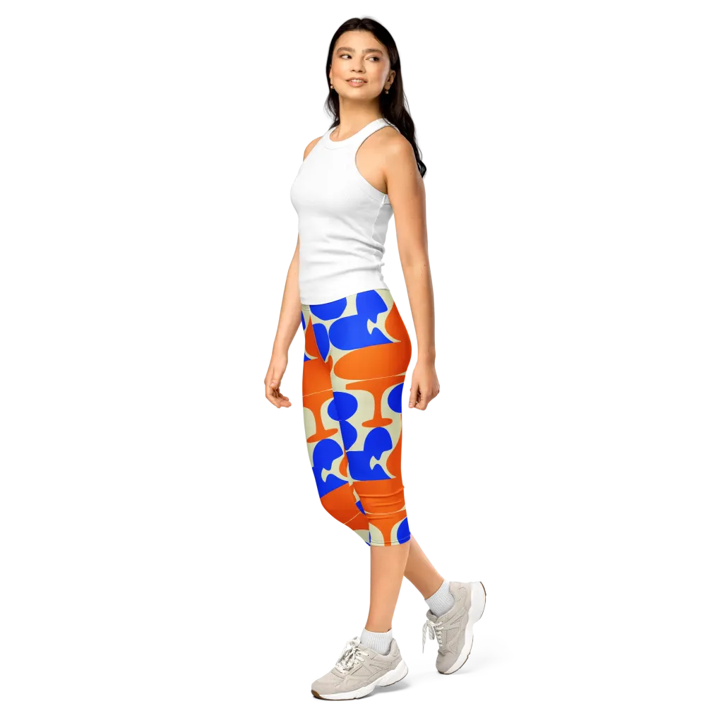 Cobalt Tangerine Totem on Capri Leggings — Left Front