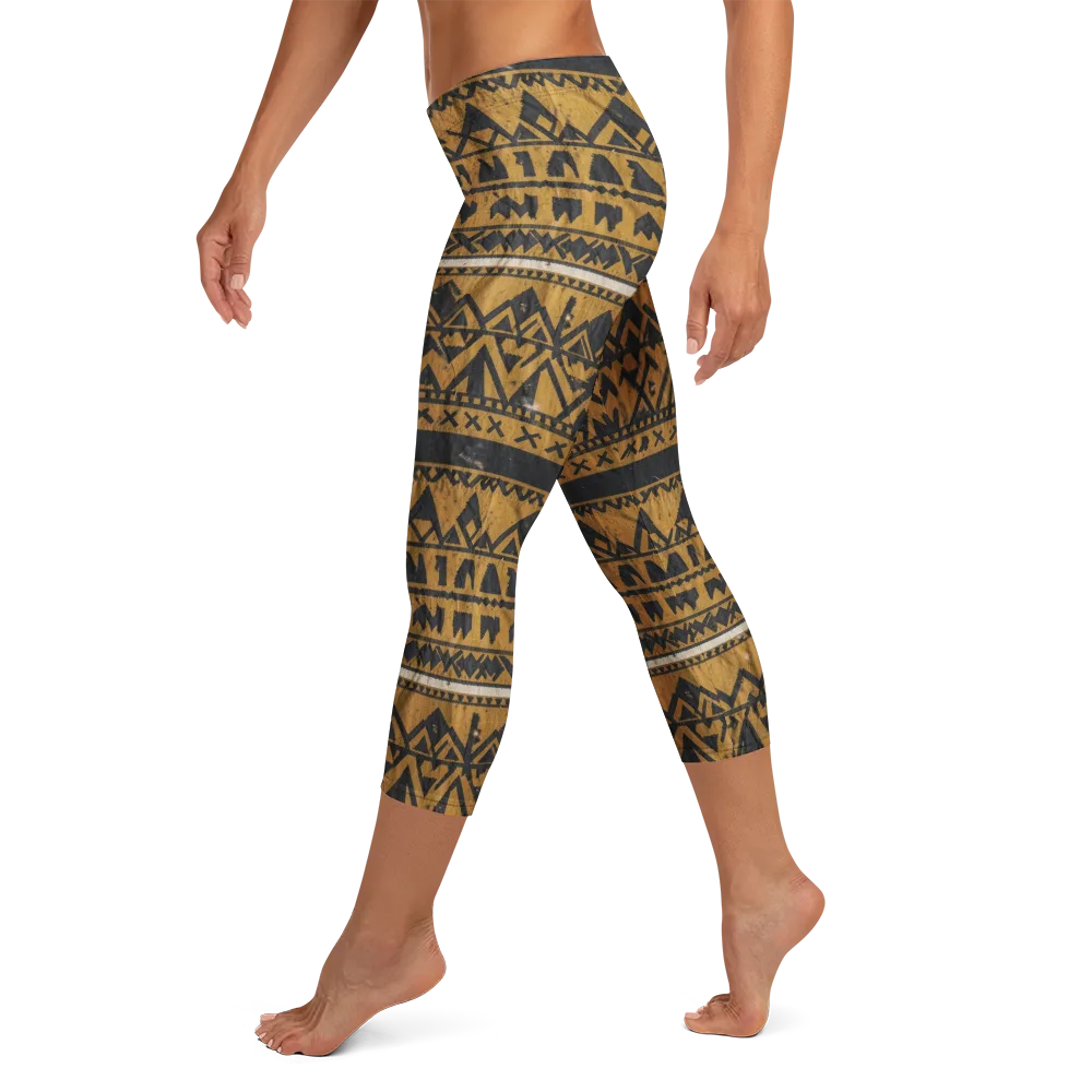 Ochre Glyph on Capri Leggings — Left